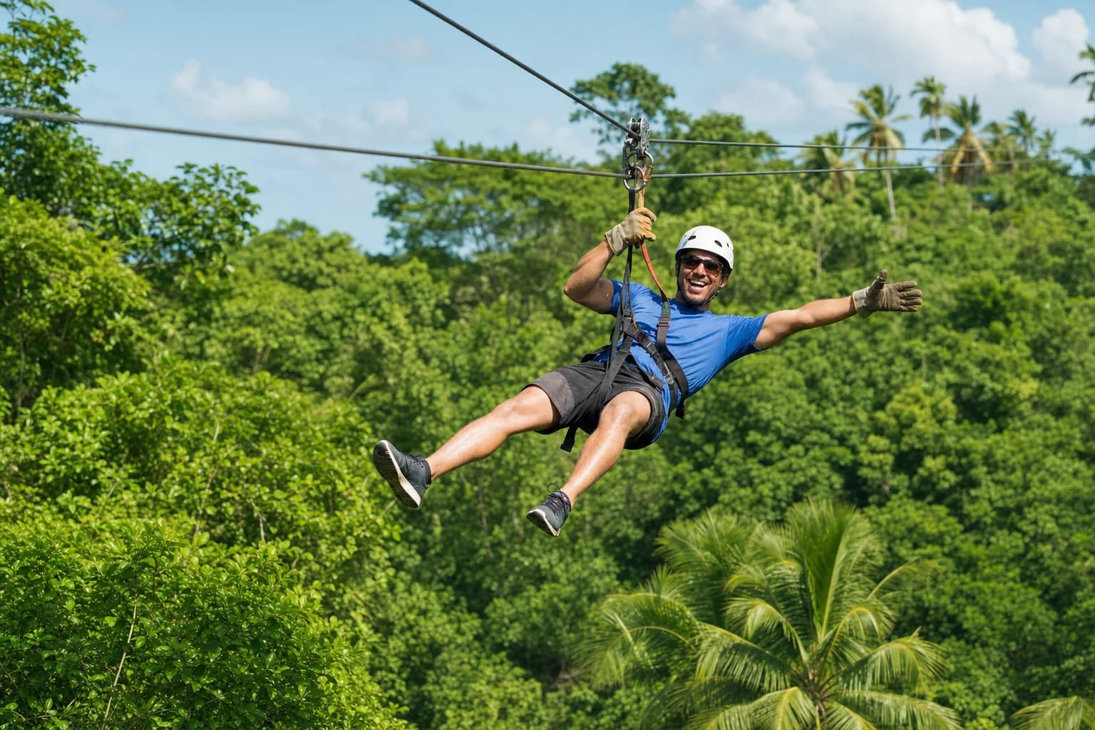 Traveler gliding on a zipline above tropical scenery